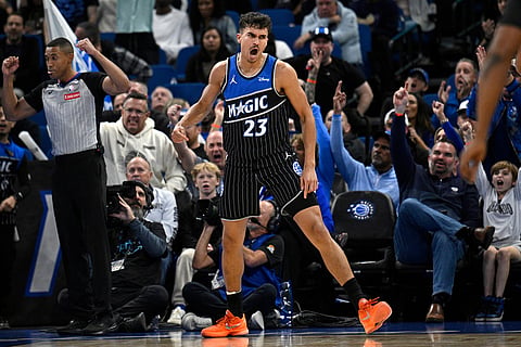 Orlando Magic forward Tristan da Silva (23) celebrates after scoring during the first half of an NBA Cup basketball game against the Miami Heat in Orlando, Florida. 