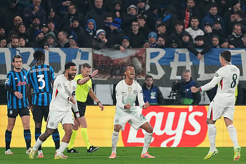 Chelsea's Joao Pedro, center, celebrates after scoring the opening goal during the Champions League opening phase soccer match between Atalanta and Chelsea, in Bergamo, Italy.