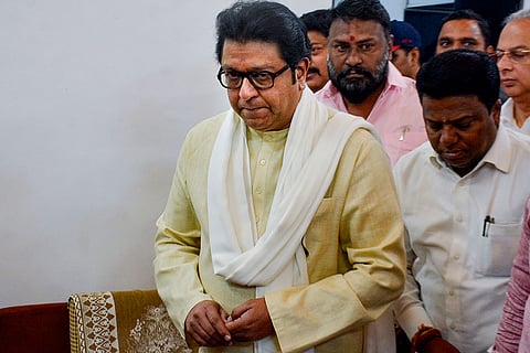 Maharashtra Navnirman Sena (MNS) Chief Raj Thackeray, centre, arrives at Thane court in connection with a 2008 rioting case