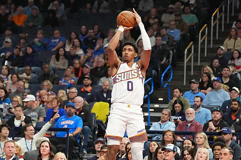 Phoenix Suns forward Ryan Dunn shoots during the first half of an NBA Cup basketball game against the Oklahoma City Thunder in Oklahoma City.