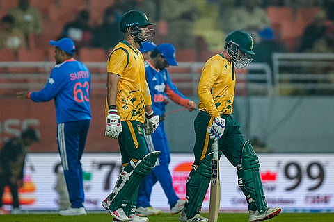 South Africa’s Reeza Hendricks, front left, and Quinton de Kock arrive to bat during the second T20 International cricket match of a series between India and South Africa, at Maharaja Yadavindra Singh International Cricket Stadium, in New Chandigarh.