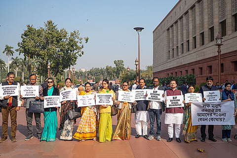 TMC MPs Kirti Azad, Sagarika Ghose, Satabdi Roy and others hold a silent protest over the issues of MGNREGA dues during the Winter session of Parliament, in New Delhi.