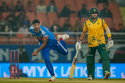 India's Arshdeep Singh bowls a delivery during the second T20 International cricket match of a series between India and South Africa, at Maharaja Yadavindra Singh International Cricket Stadium, in New Chandigarh.