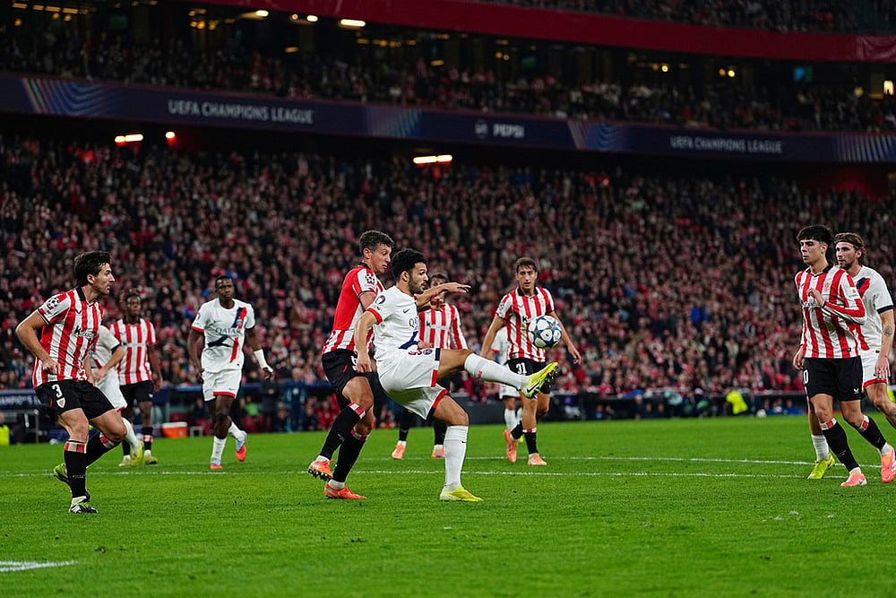 | Photo: AP/Miguel Oses : PSG's Goncalo Ramos kicks the ball as Athletic Bilbao's Mikel Vesga tries to stop him during the Champions League opening phase soccer match between Athletic Bilbao and PSG in Bilbao, Spain.