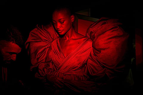 A model wears a design by De La Cierva y Nicolas backstage during Fashion Week in Madrid, Spain, Sept. 19, 2025. 