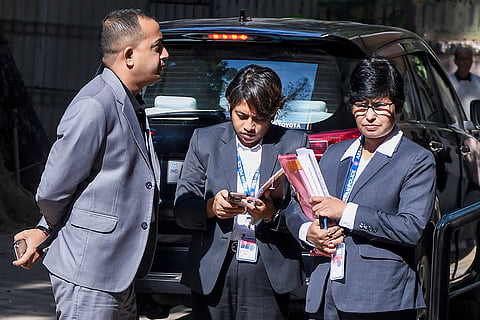 Special Investigation Team (SIT) officer Rosie Kalita (right) and other officials arrive at a court in connection with the Zubeen Garg death case, in Guwahati. The SIT on Friday submitted the chargesheet in the case.