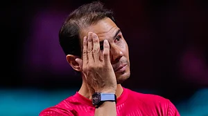 | Photo: AP/Manu Fernandez : Spain's Rafael Nadal during a tribute after playing his last match as a professional tennis player in the Davis Cup quarterfinals at the Martin Carpena Sports Hall in Malaga, southern Spain, on Nov. 20, 2024.