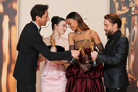 Adrien Brody, from left, winner of the award for best performance by an actor in a leading role for "The Brutalist," Mikey Madison, winner of the award for best performance by an actress in a leading role for "Anora," Zoe Saldana, winner of the award for best performance by an actress in a supporting role for "Emilia Perez," and Kieran Culkin, winner of the award for best performance by an actor in a supporting role for "A Real Pain," pose in the press room at the Oscars at the Dolby Theatre in Los Angeles, March 2, 2025.