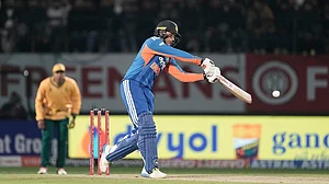 | Photo: AP/Ashwini Bhatia : India's Abhishek Sharma plays a shot during the third T20 cricket match between India and South Africa in Dharamshala.