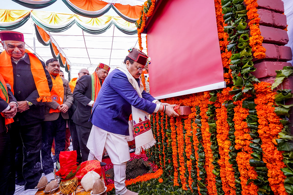 BJP National President and Union Minister JP Nadda, in blue, during the foundation stone laying ceremony of the party's new state office, at Majthai, in Shimla district, Himachal Pradesh, Saturday, Dec. 13, 2025.  - PTI