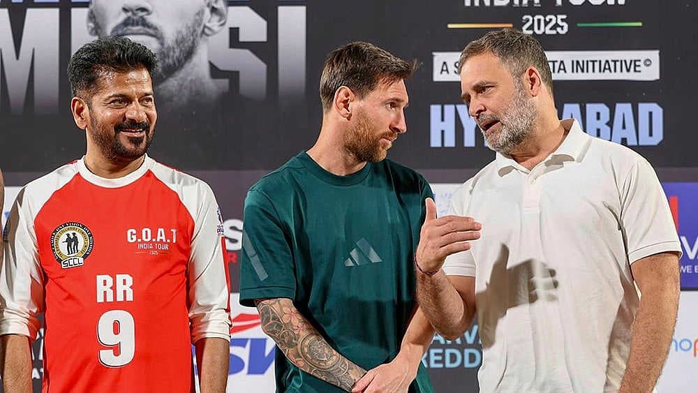 | Photo: AICC via PTI : Leader of Opposition in the Lok Sabha Rahul Gandhi, Telangana Chief Minister Revanth Reddy with Argentine footballer and 2022 FIFA World Cup winning captain Lionel Messi during an event as part of the 'GOAT India Tour 2025', in Hyderabad. 