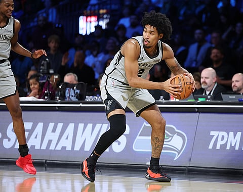 San Antonio Spurs guard Dylan Harper (2) sets to play the ball in the first half of an NBA Cup semifinals basketball game against the Oklahoma City Thunder in Las Vegas. 