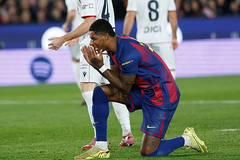 Barcelona's Marcus Rashford reacts during a La Liga soccer match between Barcelona and Osasuna in Barcelona, Spain.