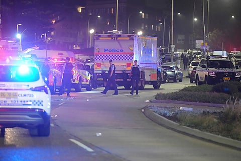 Police cordon off an area at Bondi Beach after a reported shooting in Sydney.
