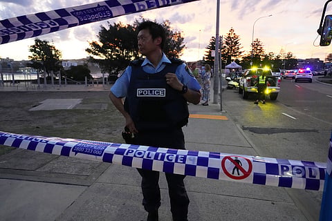 Police cordon off an area at Bondi Beach after a reported shooting in Sydney.