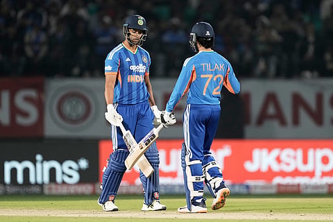India's Shivam Dube, left, and Tilak Varma greets each other after India won the match during the third T20 cricket match between India and South Africa in Dharamshala.
