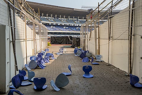 Broken plastic seats scattered at Salt Lake Stadium premises in the aftermath of chaos during an event featuring Argentine football icon Lionel Messi, in Kolkata.