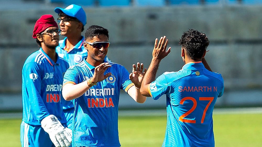 | Photo: AP/Ahmed Ramzan : Asia Cup U-19 IND vs PAK: India's Samarth Nagaraj, right, celebrates the wicket of Pakistan's Shahzaib Khan 