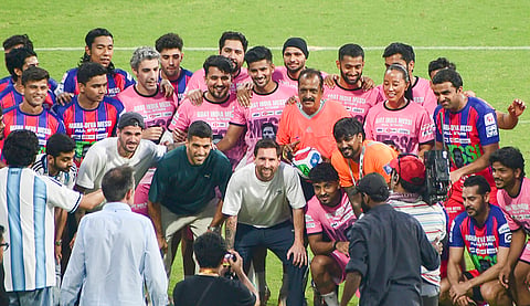 Argentine footballer Lionel Messi poses for a picture during the 'GOAT India Tour 2025', at Wankhede Stadium, in Mumbai.