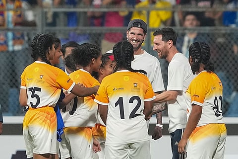 Mumbai: Argentine footballer Lionel Messi with his Inter Miami teammates Rodrigo De Paul during the 'GOAT India Tour 2025', at Wankhede Stadium, in Mumbai.