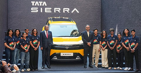 Chairperson of Tata Motors Natarajan Chandrasekaran, Tata Passenger Electric Mobility head Shailesh Chandra and members of the Indian women's cricket team pose with a car during a felicitation event, in Mumbai. Tata Motors honours the Indian women's cricket team for their historic World Cup win by gifting each player the first units of the newly launched Tata Sierra SUV. 
