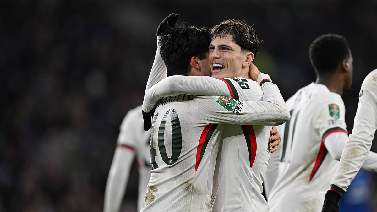 Chelsea's goalscorer Alejandro Garnacho celebrates with Facundo Buonanotte during the EFL Cup match against Cardiff City on December 16, 2025.