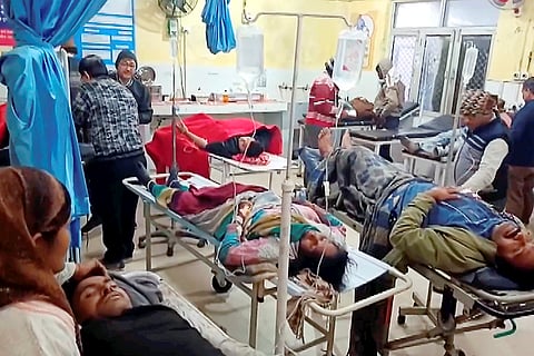 Injured passengers receive treatment at a hospital after a fog-hit pile-up involving buses and cars sparked fires on the Yamuna Expressway, in Mathura.