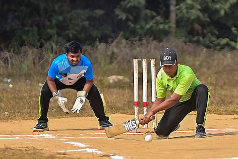 Specially-abled sportspersons play cricket during the inauguration of the 'Khelo Tripura Para Games 2025', in Agartala.