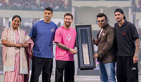 From left, Delhi Chief Minister Rekha Gupta, Uruguayan footballer Luis Suarez, Argentine footballer Lionel Messi, ICC Chairman Jay Shah and Argentine footballer Rodrigo De Paul during an event as part of the 'GOAT India Tour 2025', at Arun Jaitley Stadium in New Delhi. 