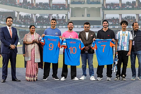 From left, President of the Delhi and District Cricket Association Rohan Jaitley, Delhi Chief Minister Rekha Gupta, Uruguayan footballer Luis Suarez, Argentine footballer Lionel Messi, ICC Chairman Jay Shah, Argentine footballer Rodrigo De Paul and others during an event as part of the 'GOAT India Tour 2025', at Arun Jaitley Stadium in New Delhi.