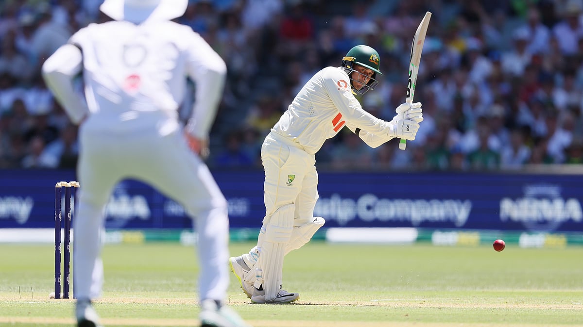| Photo: AP/James Elsby : Australia's Usman Khawaja plays a shot during play on day one of the third Ashes Test  on December 17, 2025.