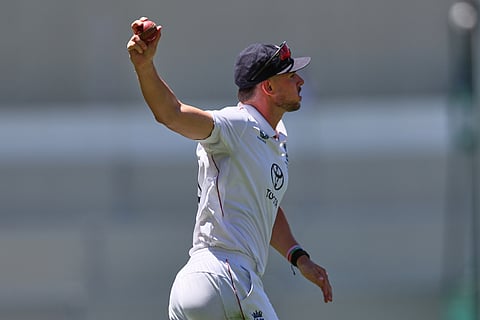 England's Josh Tongue celebrates after taking a catch to dismiss Australia's Usman Khawaja during play on day one of the third Ashes cricket test between England and Australia at the Adelaide Oval in Adelaide, Australia.