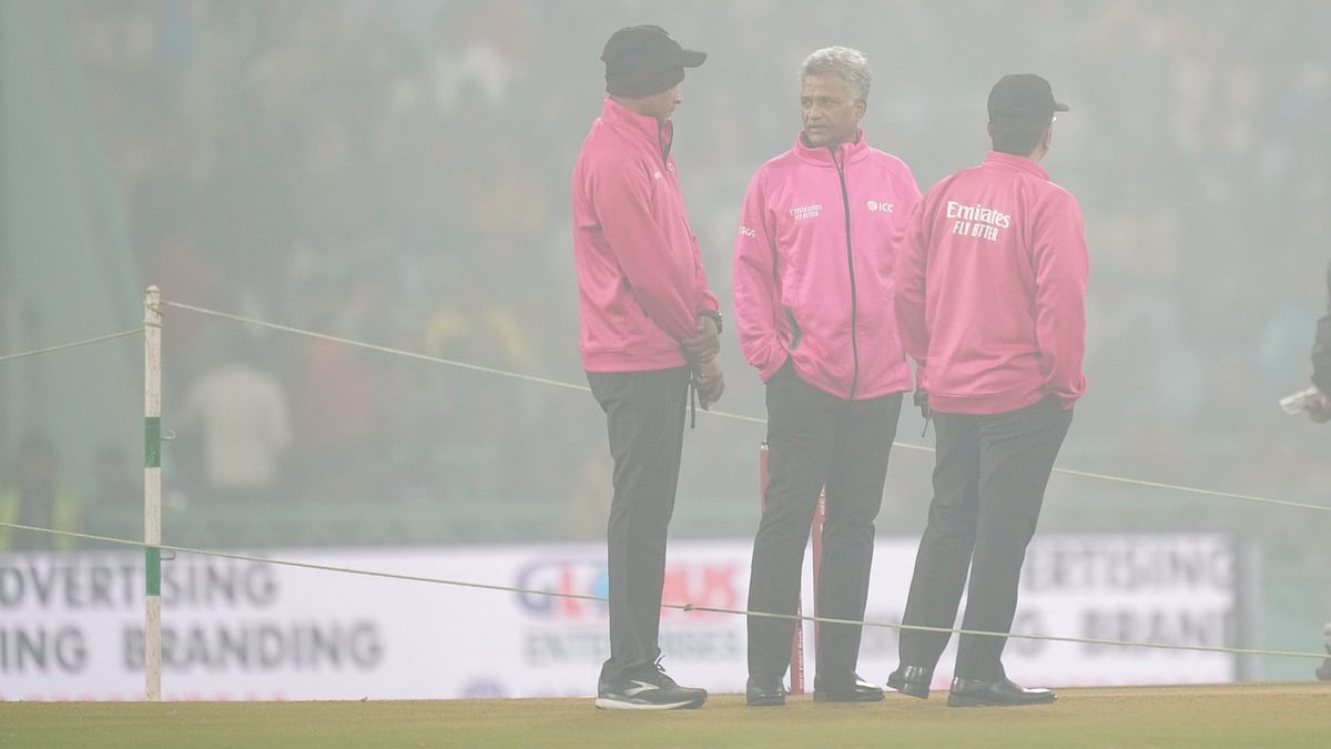(PTI Photo/Ravi Choudhary) : Lucknow: Umpires interact among themselves amid fog at Ekana Cricket Stadium ahead of the fourth T20 International cricket match of a series between India and South Africa, in Lucknow, Wednesday, Dec. 17, 2025