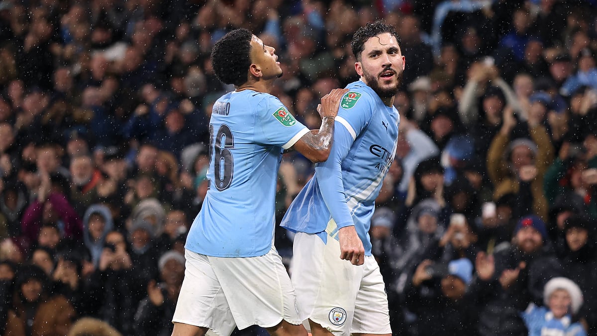 Manchester City's Rayan Cherki and Savinho