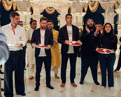 Argentine footballers Lionel Messi and Rodrigo De Paul, Uruguayan footballer Luis Suarez with Reliance Industries Chairman Mukesh Ambani's son Anant Ambani and his wife Radhika Merchant perform 'aarti' during a visit at Vantara, a wildlife rescue, rehabilitation and conservation centre, in Jamnagar, Gujarat. 