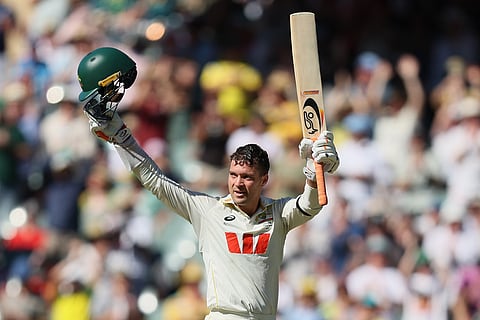 Australia's Alex Carey celebrates his century during play on day one of the third Ashes cricket test between England and Australia at the Adelaide Oval in Adelaide, Australia.
