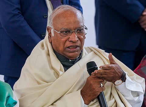 Congress President Mallikarjun Kharge addresses a press conference, in New Delhi. The Congress on Wednesday demanded Prime Minister Narendra Modi and Union Home Minister Amit Shah's resignation after a Delhi court refused to take cognisance of the ED's money laundering charge against Sonia Gandhi and Rahul Gandhi in the National Herald case. 