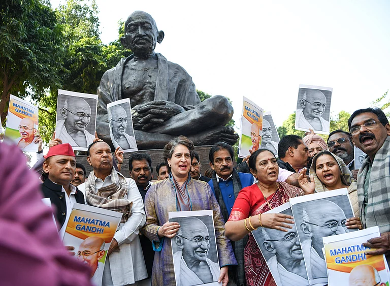 Opposition MPs protest over the MGNREGA issue at the Parliament premises New Delhi, Dec 16 (ANI): Congress MP Priyanka Gandhi, along with other opposition MPs, holds a protest over the MGNREGA issue at Parliament premises during the ongoing Winter Session, in New Delhi on Tuesday. New Delhi Delhi India - IMAGO / ANI News