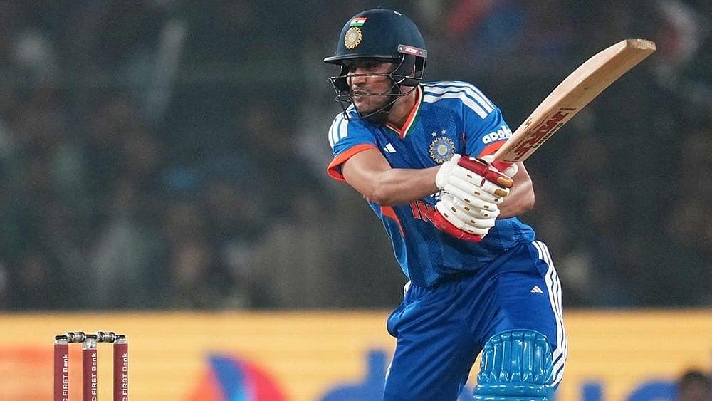 | Photo: AP/Rafiq Maqbool : India's Shubman Gill plays a shot during the first T20 International cricket match between India and South Africa in Cuttack, India.