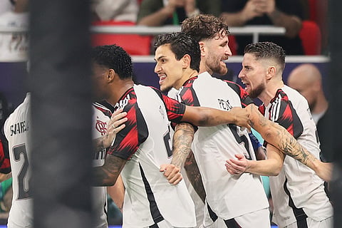 Flamengo's Jorginho, right, celebrates with his teammates after scoring his side's opening goal during the FIFA Intercontinental Cup final soccer match between Flamengo and Paris Saint-Germain in Doha, Qatar.