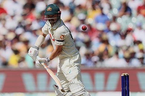 Australia's Travis Head bats during play on day three of the third Ashes cricket test between England and Australia in Adelaide, Australia.