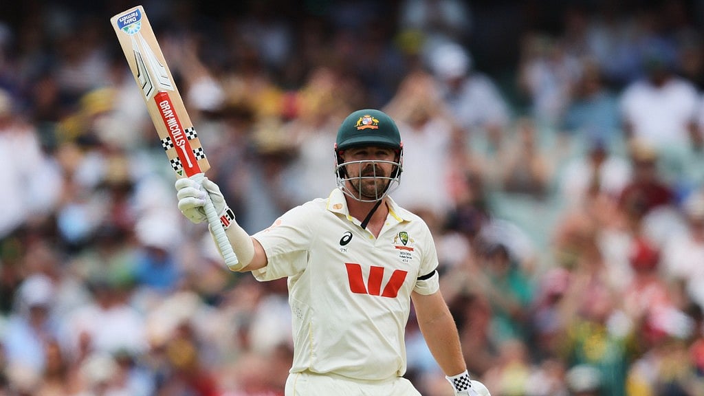 AP : Travis Head celebrates his half century on day three of the third Ashes Test between England and Australia in Adelaide.