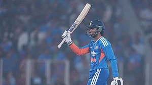 | Photo: AP/Ajit Solanki : Tilak Varma proved his match fitness with a 24-ball 38, a fine running catch and a wicket as well in the T20 World Cup warm-up match between India A and USA.