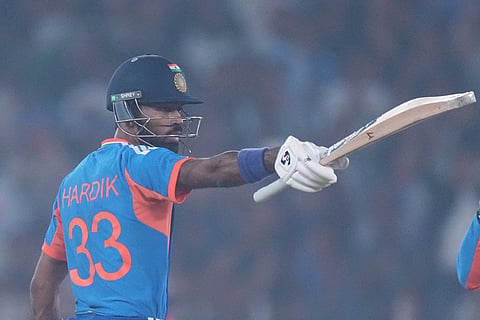 India's Hardik Pandya celebrates after scoring fifty runs during the fifth T20 cricket match between India and South Africa in Ahmedabad.