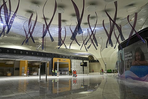 Worker at the Navi Mumbai International Airport, in Navi Mumbai. Adani Group plans to invest Rs 1 lakh crore in its airports business over the next five years, betting on sustained growth in India's aviation sector, which is expected to expand at 15-16 per cent annually, a top group official said. 