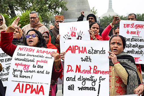 All India Progressive Women's Association (AIPWA) members hold a protest over the hijab controversy involving Bihar Chief Minister Nitish Kumar, in Patna.