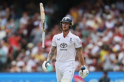 England's Ben Stokes throws his bat as he reacts after he was out bowled during play on day three of the third Ashes cricket test between England and Australia in Adelaide, Australia.
