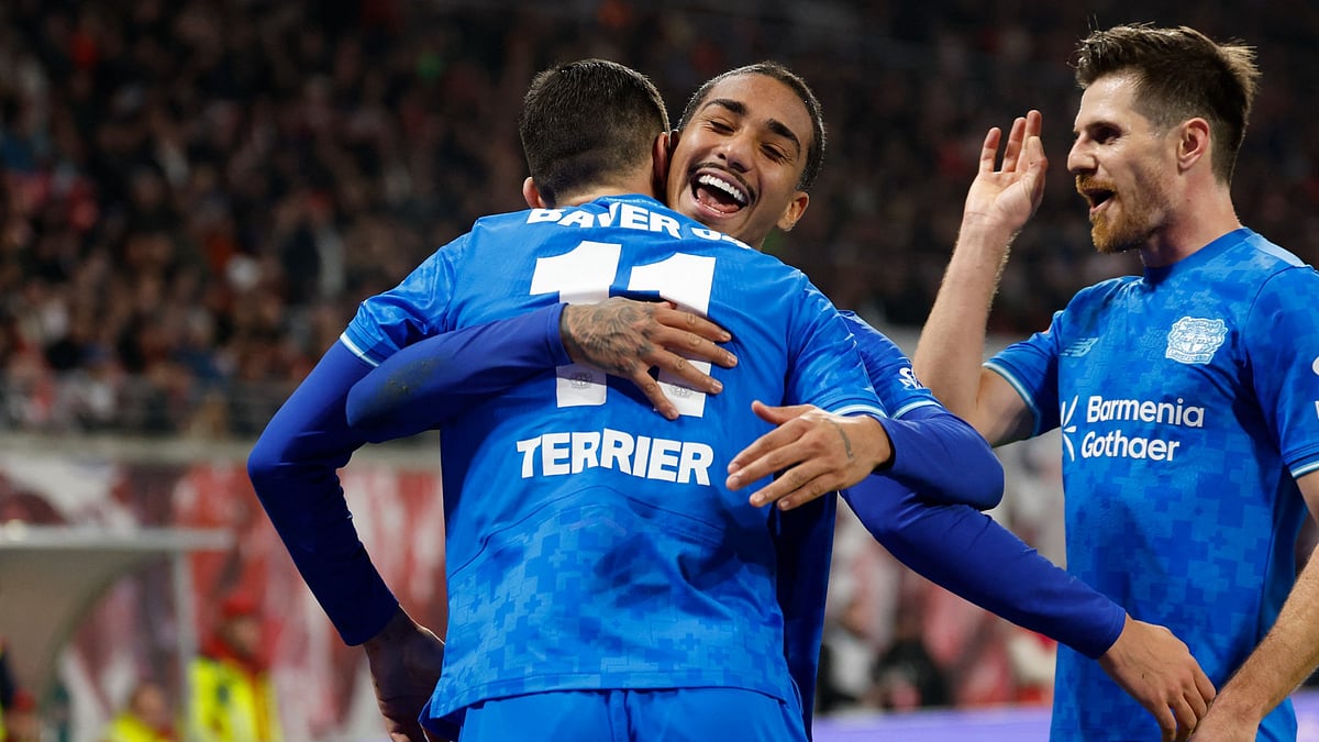 Martin Terrier celebrates scoring for Bayer Leverkusen during the Bundesliga match against RB Leipzig on December 20, 2025.