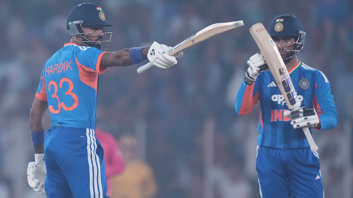 | Photo: AP/Ajit Solanki : India's Hardik Pandya celebrates after scoring fifty runs during the fifth T20 cricket match between India and South Africa in Ahmedabad, India, Friday, Dec. 19, 2025.