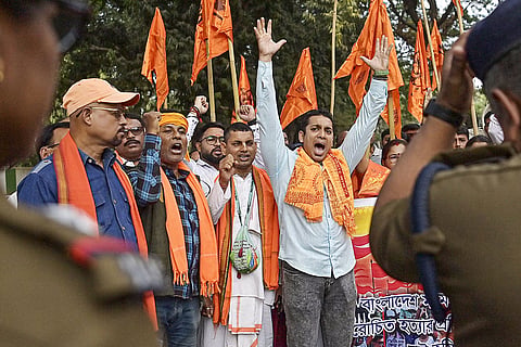 Members of 'Hindu Jagran Manch' stage a protest over the alleged lynching of a Hindu man Dipu Chandra Das in Bangladesh, near Bangladesh Assistant High Commission, in Agartala.